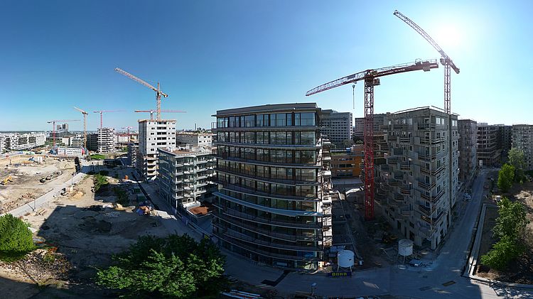 Panoramafoto Baustelle Village im Dritten von oben