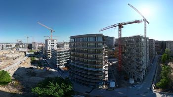Panoramafoto Baustelle Village im Dritten von oben