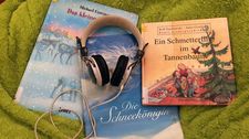 Kopfhörer und Kinderbücher